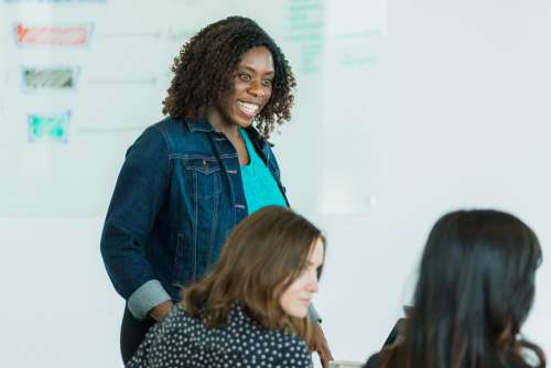 Happy Woman At Meeting Photo