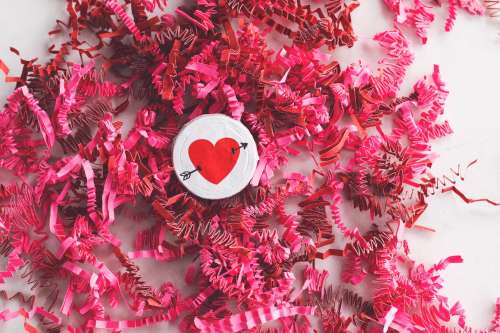 Heart Candy On Top Of Pink Decorations Photo