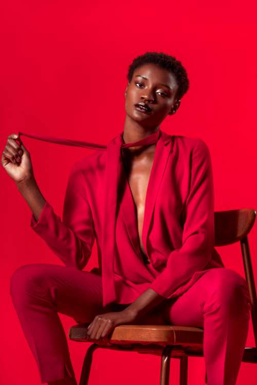 High Fashion Model In Red Suit Photo