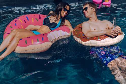 His & Hers Pool Floats Photo
