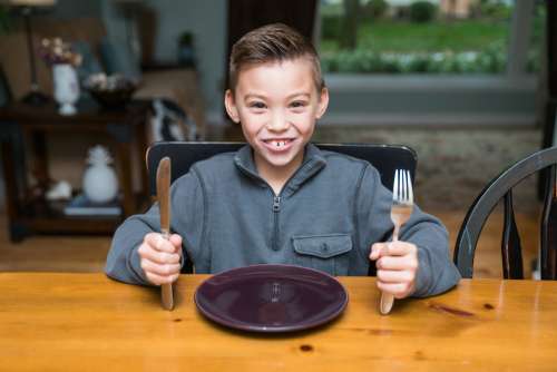 Kid Boy Ready For Dinner Photo