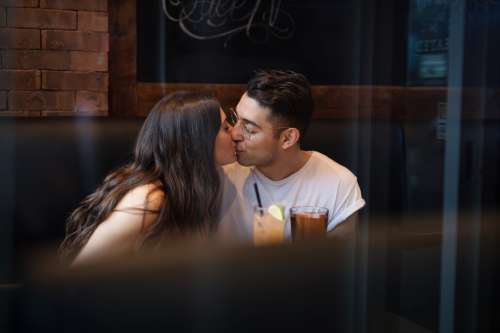 Kissing At Bar Photo