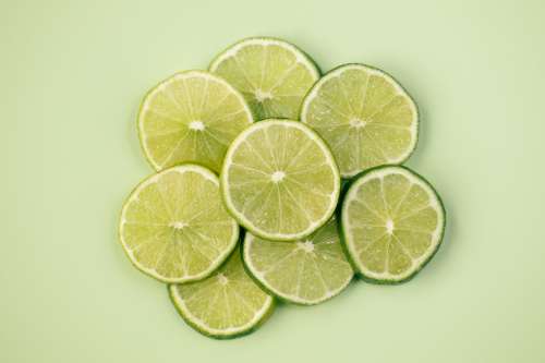 Lime Slices On Green Photo