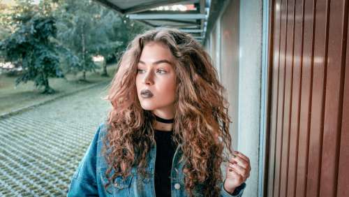 Long Curly Hair And Dark Lipstick Photo