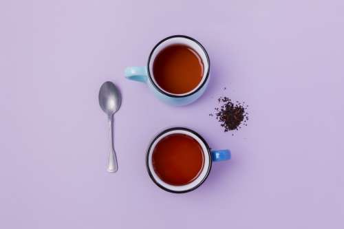 Loose Leaf Tea Brewed On Purple Photo