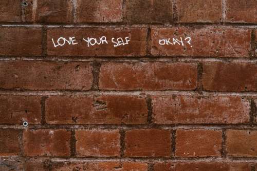 Love Message On Brick Wall Photo