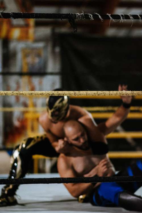 Luchador Holds Opponent In Headlock Photo