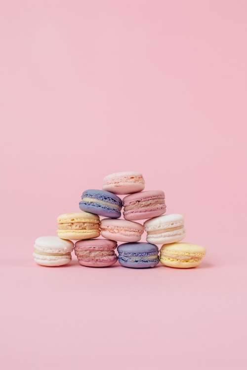 Pastel Macaron Pyramid On Pink Portrait Photo