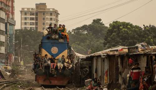 People Finding A Seat On A Passing Train Photo