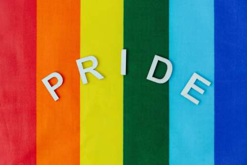 Pride Word On Pride Flag Photo
