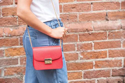 Red Handbag With Gold Detail Photo