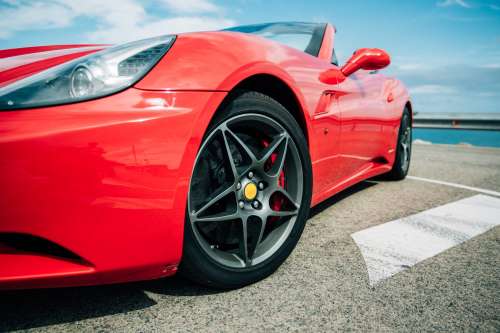 Red Sports Car Wheel Close Up Photo