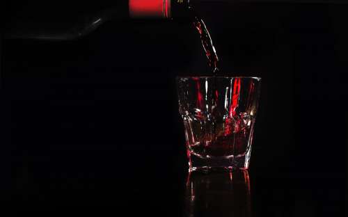 Red Wine Pouring Photo