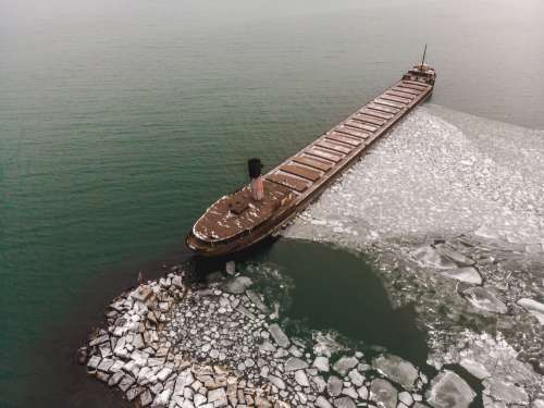 Rusting Freighter On Icy Sea Photo