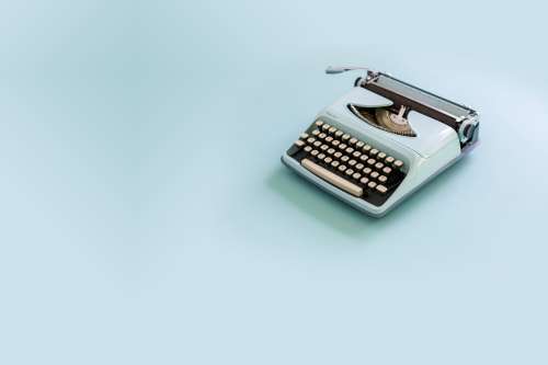 Simple Blue Typewriter Photo