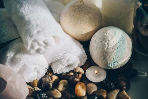 Spa Candle Towel And Stones Photo