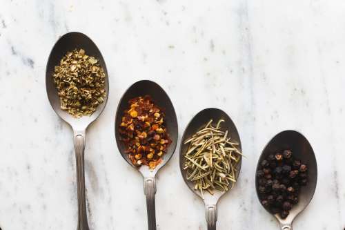 Spoons Full Of Spices Photo