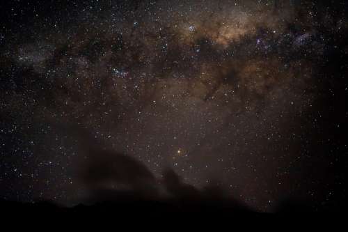 Starry Night Above With Clouds Below Photo