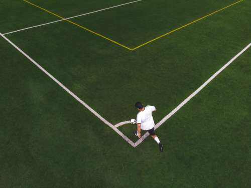 Striker About To Kick A Corner Photo