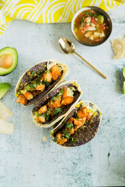 Taco Shells With Black Beans And Fried Chicken Photo