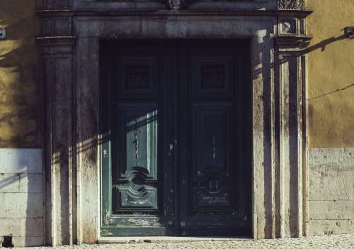The Door Of A Historical Building Catching The Light Photo