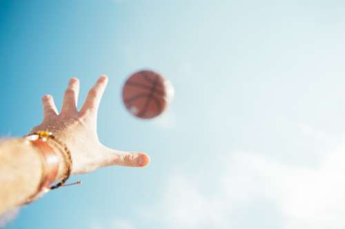 Throwing Basketball Photo