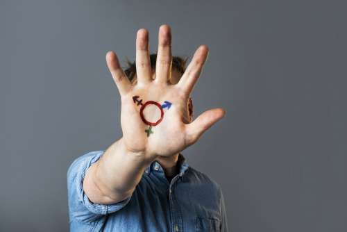 Transgender Pride Symbol Painted On Hand Photo