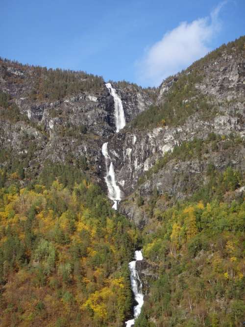 Waterfall Over Rocky Cliff Photo
