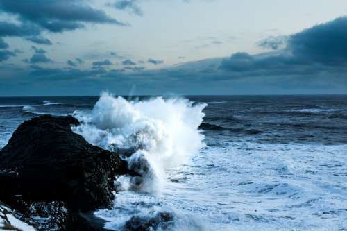 Waves Crash On Iceland Rocky Shore Photo