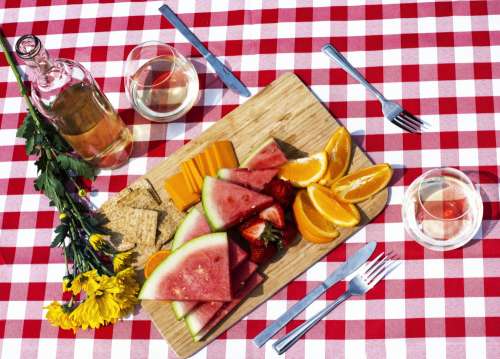 Wine And Fruit On Picnic Table Photo