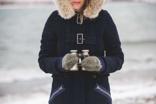 Winter Woman With Binoculars Photo