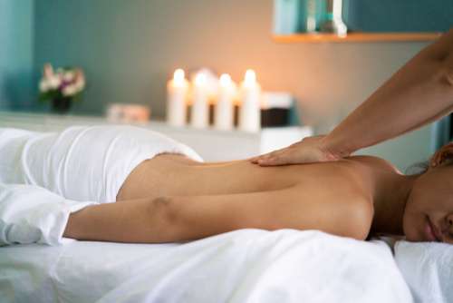 Woman Getting Back Massage Photo