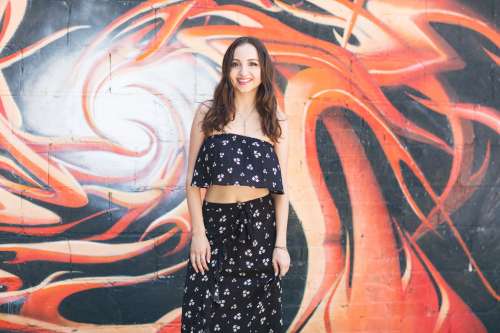 Woman Poses By Alley Wall Photo