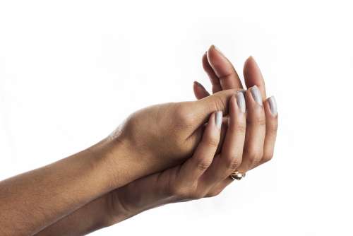 Womans Cupped Hands Together Photo