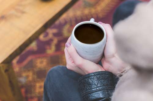 Womans Hands Holding Coffee Photo