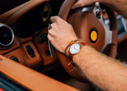 Wrist Watch On Driving Arm Photo