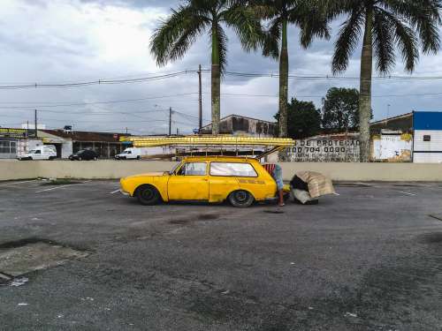 Yellow Car In Tropics Photo