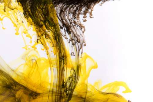 Yellow Ink With Black Drops Photo