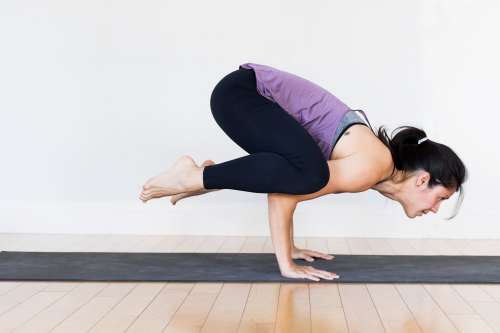 Young Woman Doing Yoga Balancing Photo