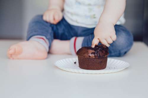 Baby eating muffin 2
