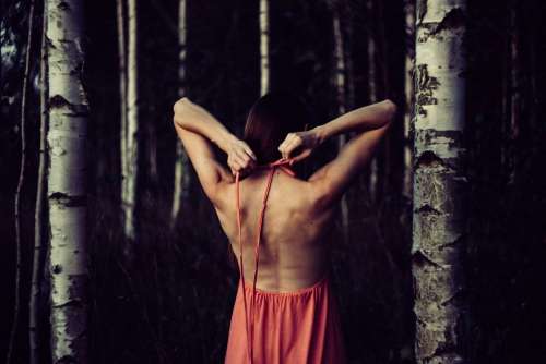 Backless dress in the woods