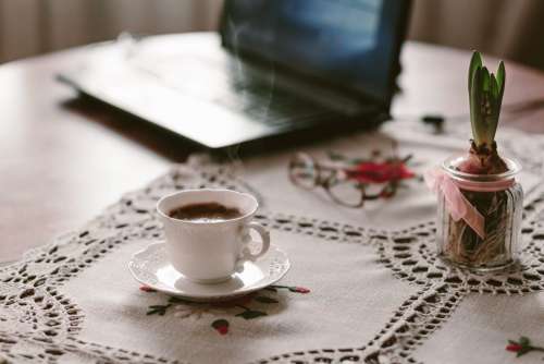 Cup of coffee, flower and laptop 2