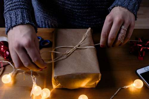 Female decorating a gift 3