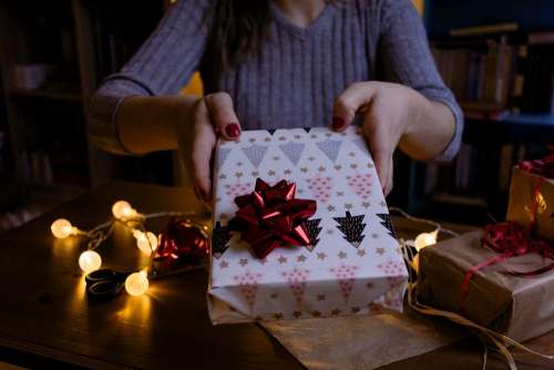 A female holding a christmas gift 2