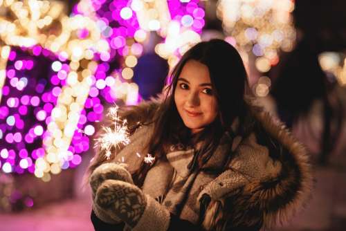 Girl holding a sparkler 2