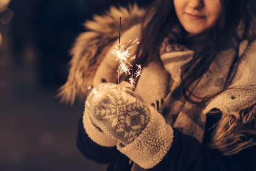 Girl holding a sparkler 3