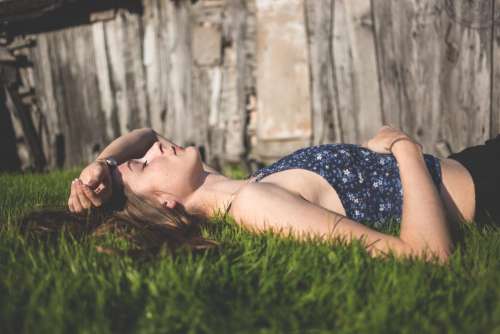 Girl laying on grass