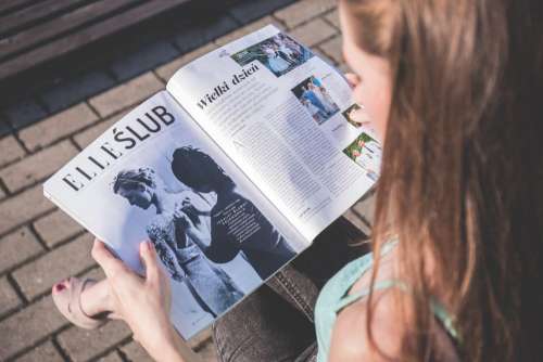 Girl reading a magazine
