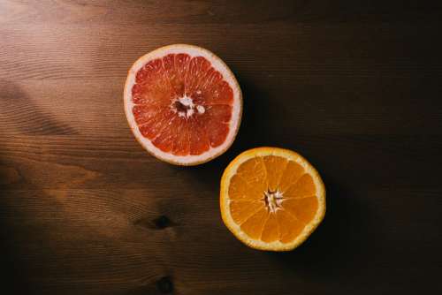 Grapefruit and orange cut in half