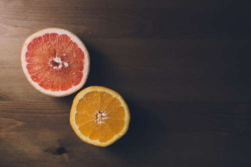 Grapefruit and orange cut in half 2
